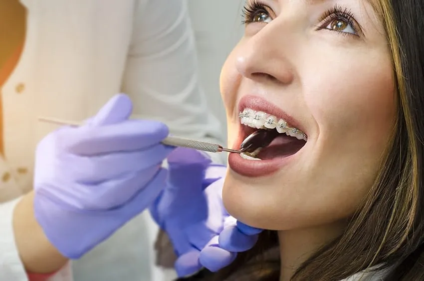 why do dentist remove teeth for braces